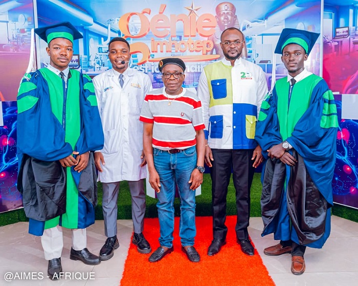 Michel Gowou et Dr Serge Michel Kodom au milieu de la photo